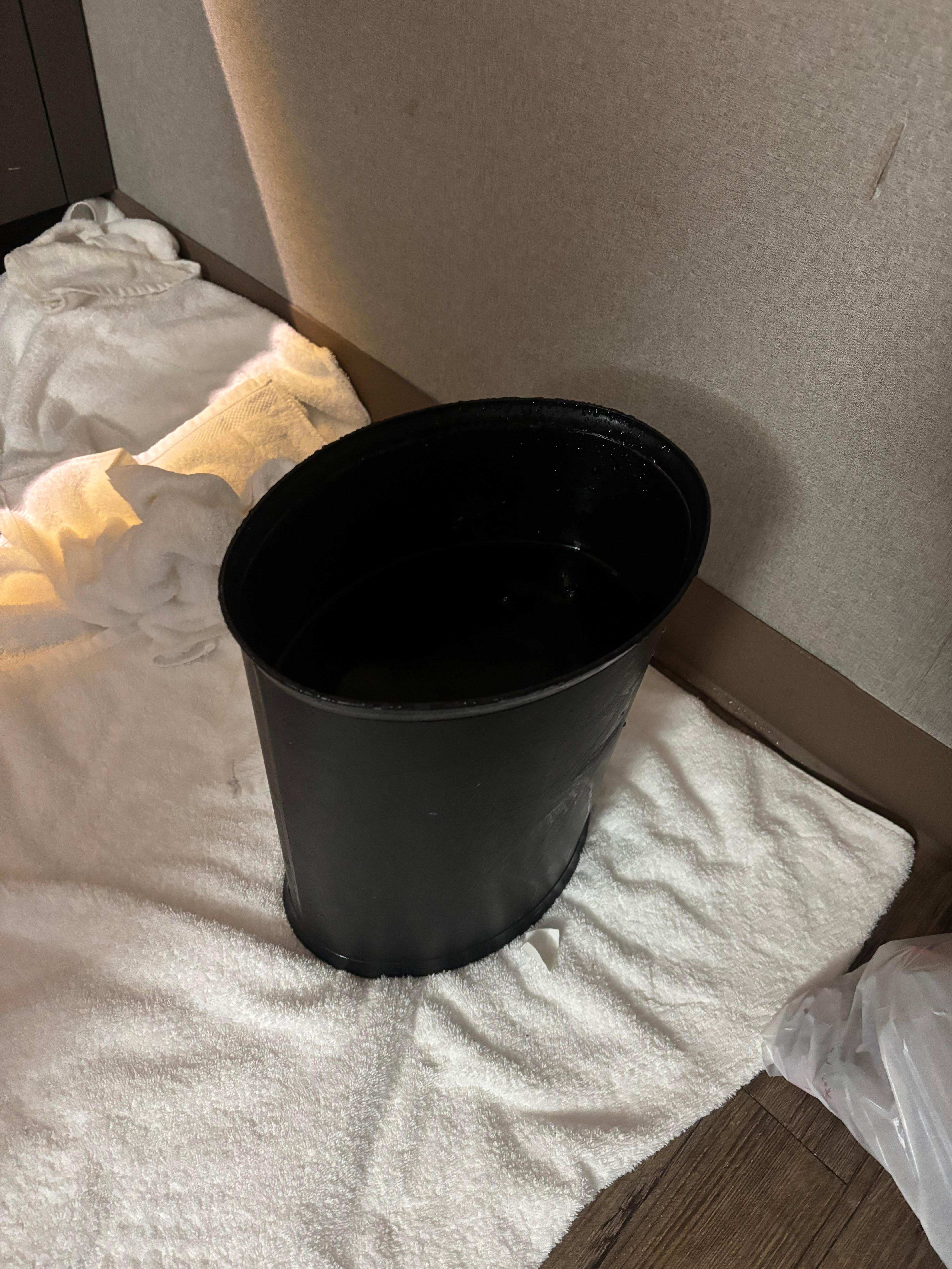 Water coming from AC unit in trash can 