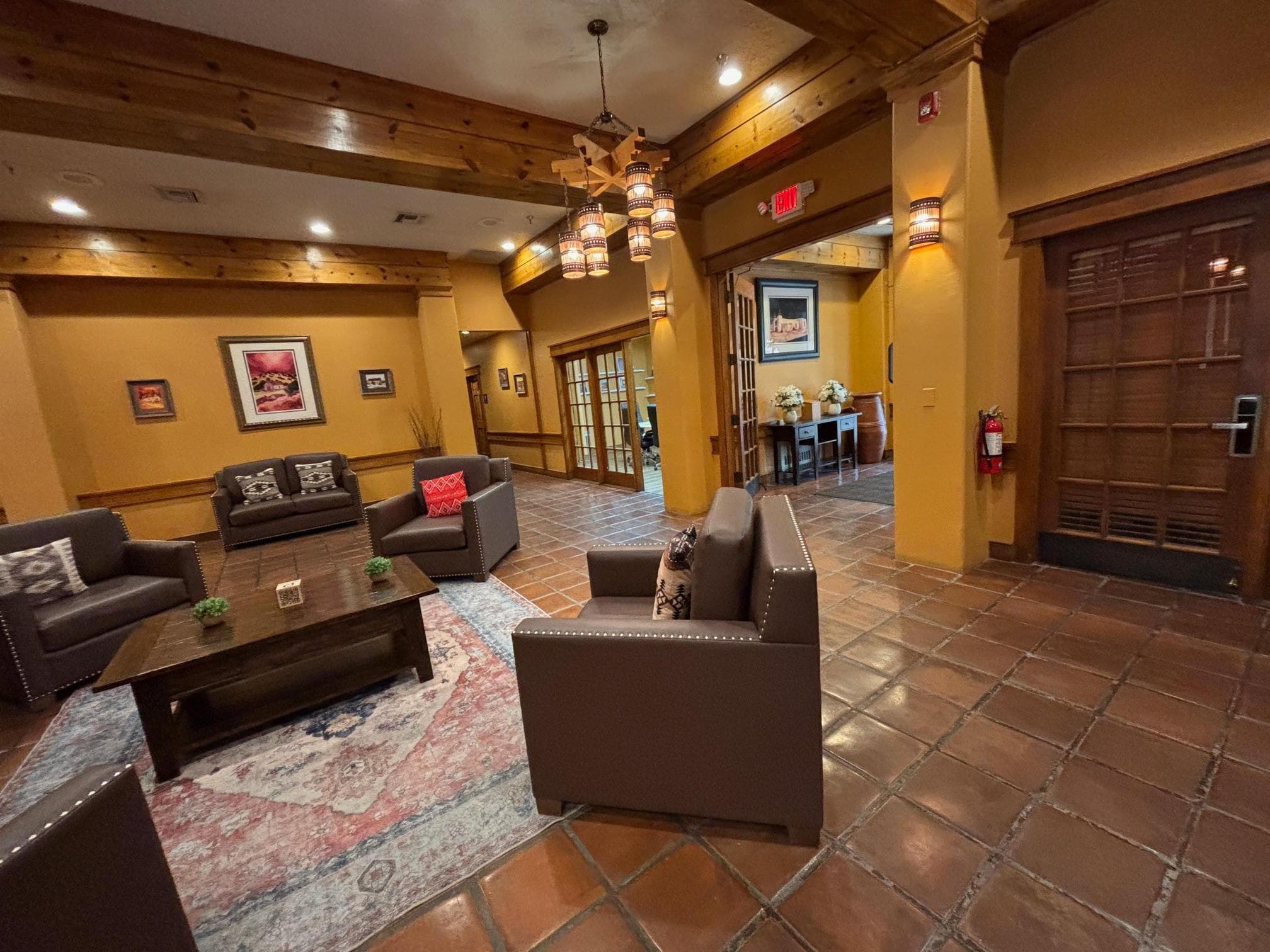 Another area of the Lobby close to the front desk. There is coffee in the Lobby all day.