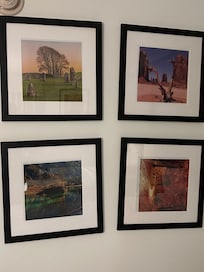 Photos on the wall: note one is sideways. So creepy.
