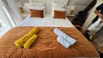 Cute towels with flowers on our bed. Such a sweet detail💗