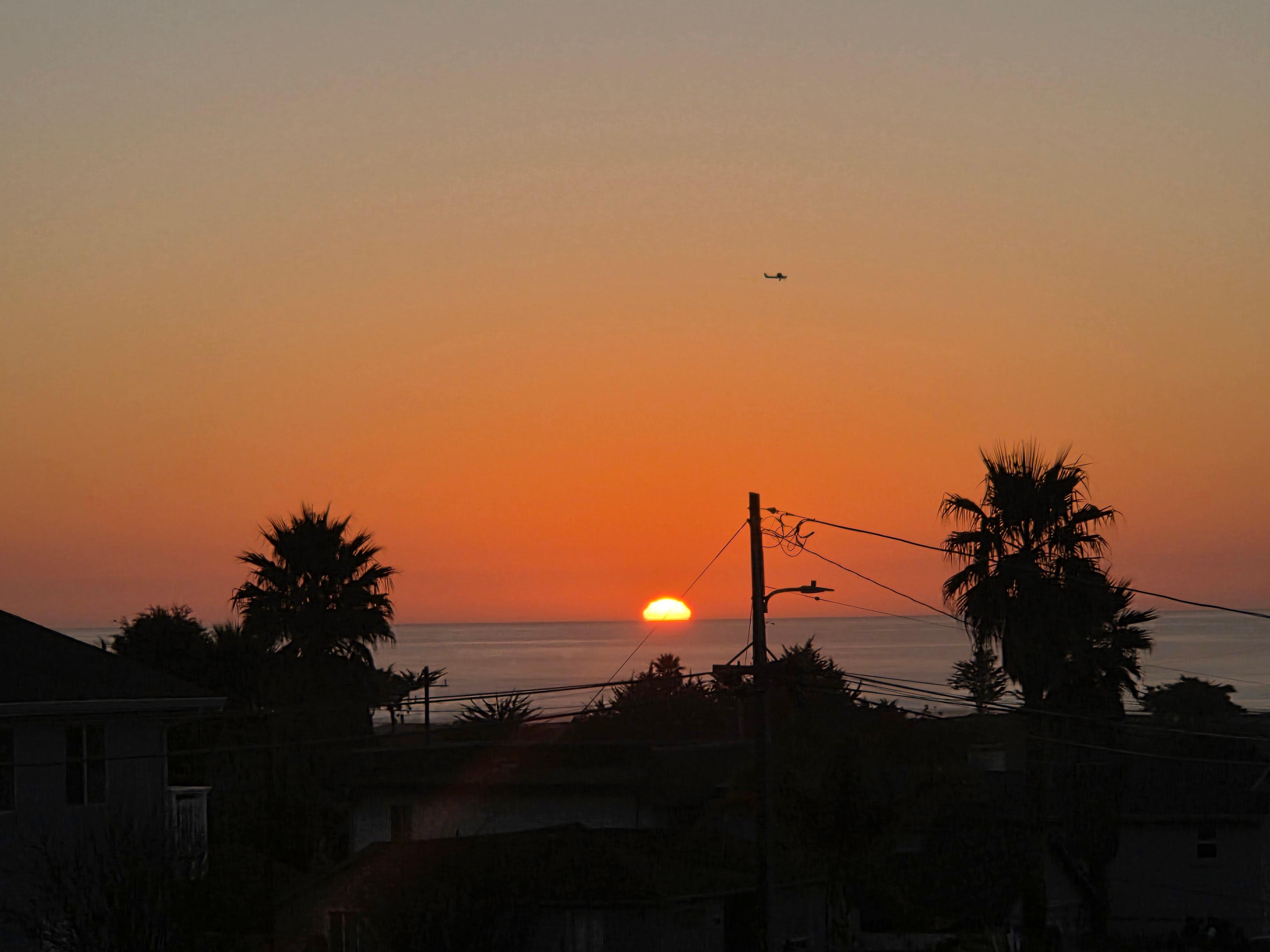 Roof top view of the sunset.