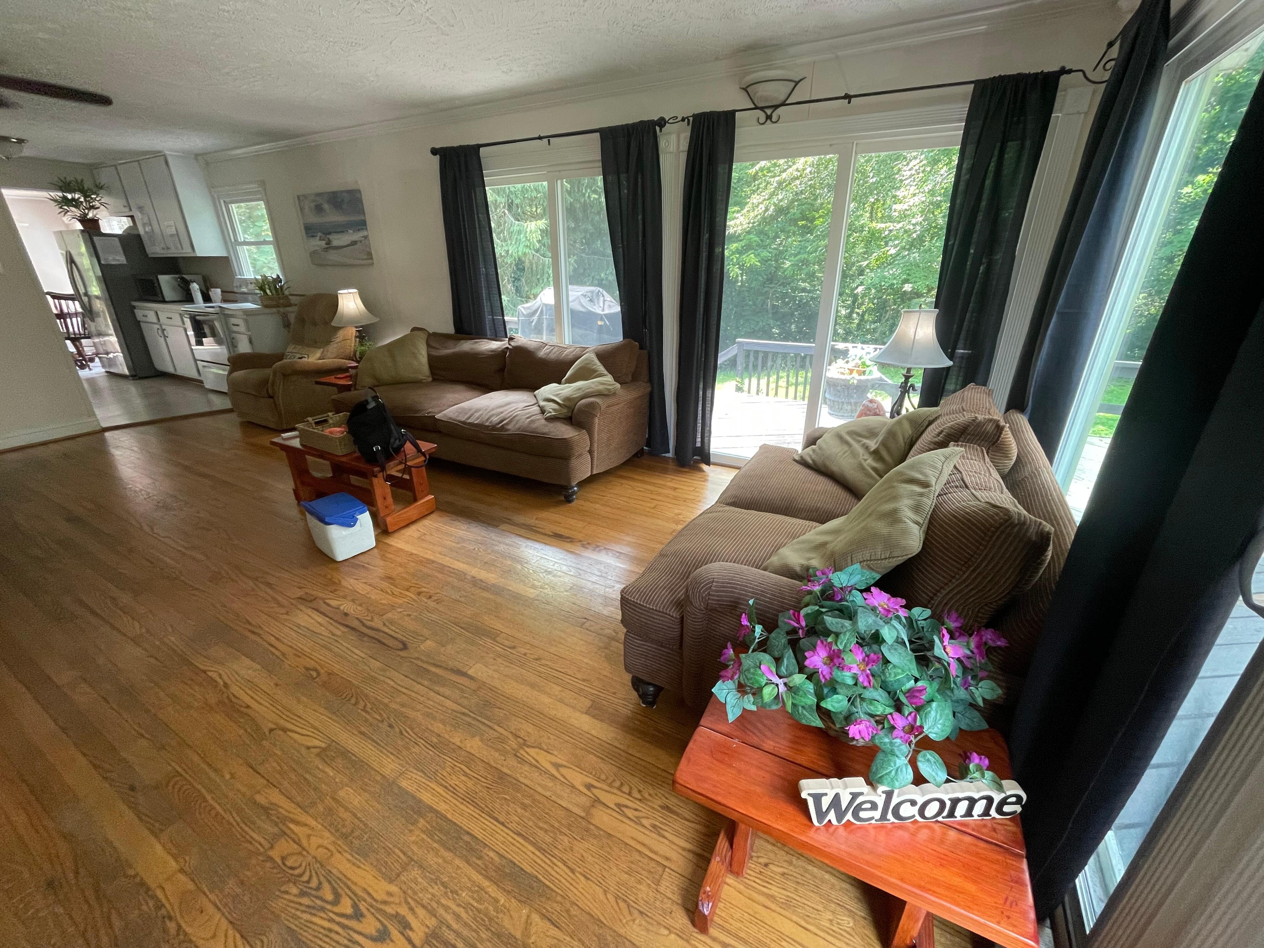 We loved the gorgeous windows and light with the pretty lush green yard!