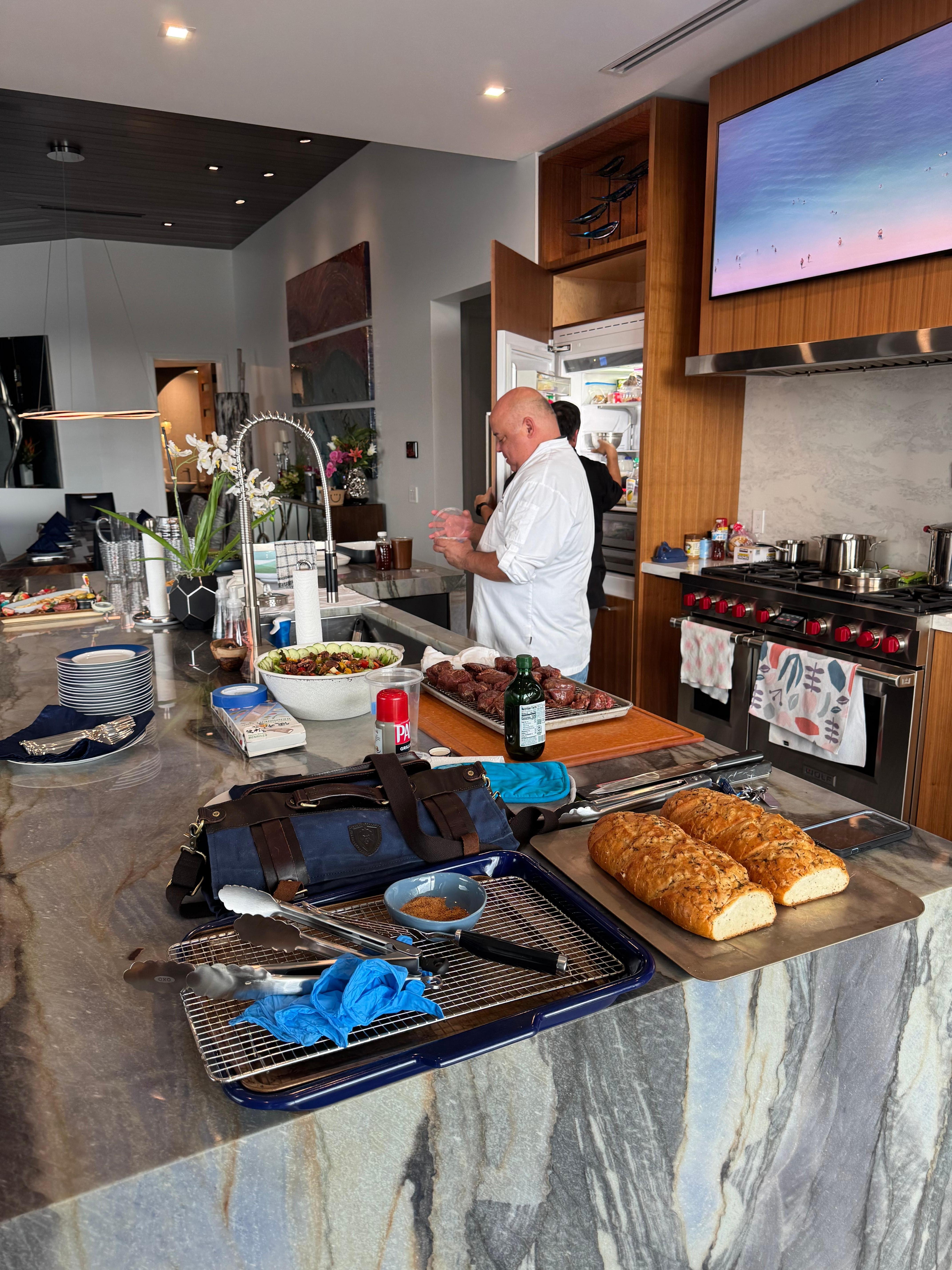 Wade and Javier preparing dinner