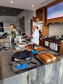 Wade and Javier preparing dinner