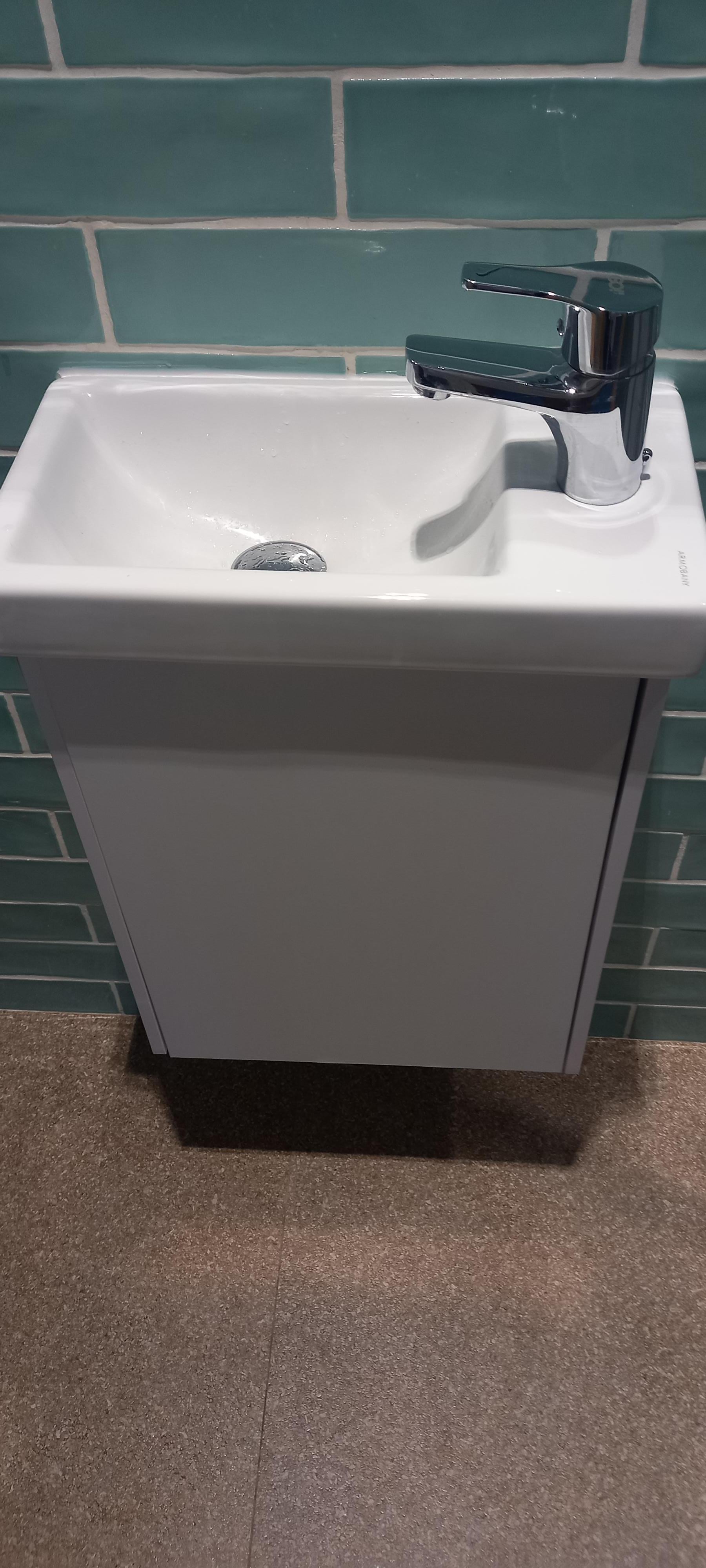 Sink in the bathroom, far too small