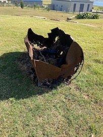 Online pics show a nice big fire pit, well this is it, tetanus waiting to happen.