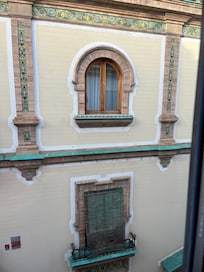Charming tile work on the adjacent building.