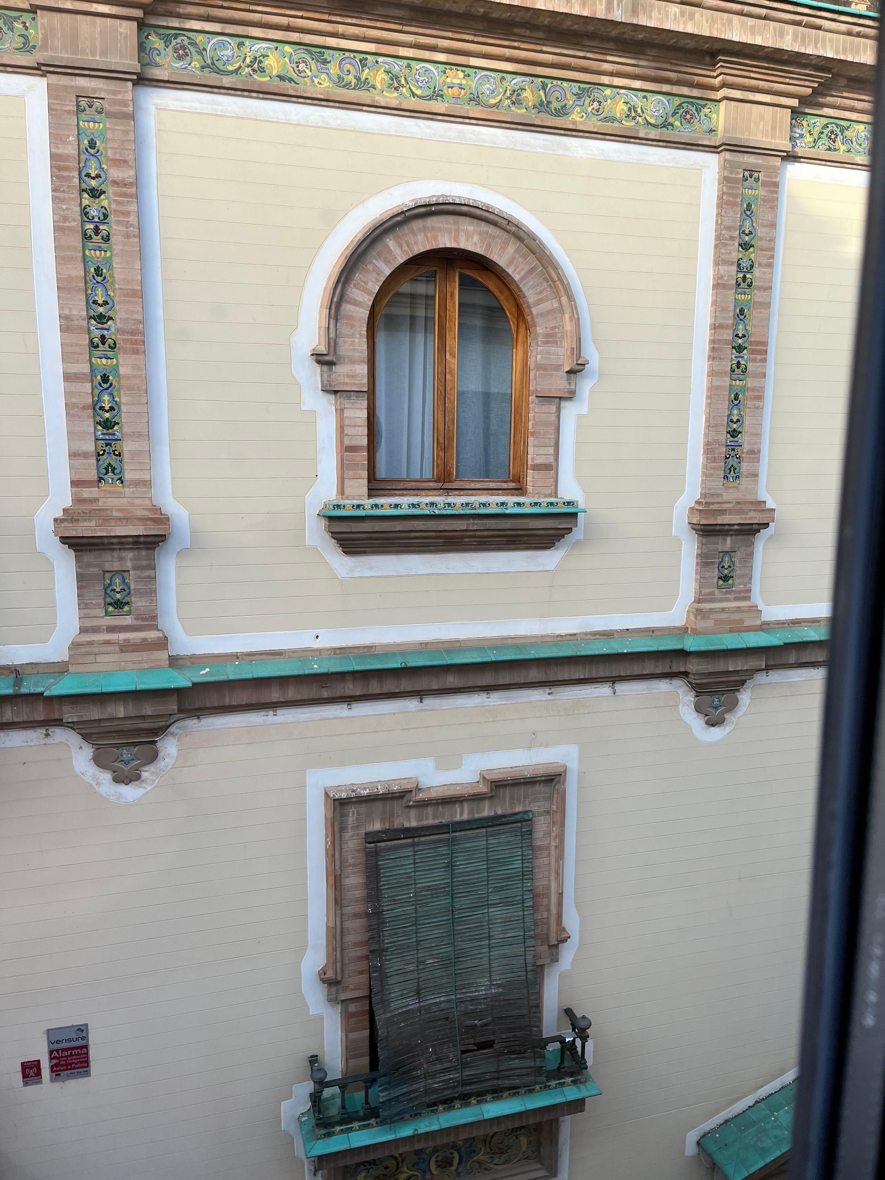 Charming tile work on the adjacent building.
