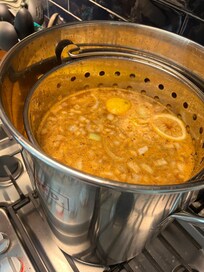 Crab boil in the biggest pot ever.