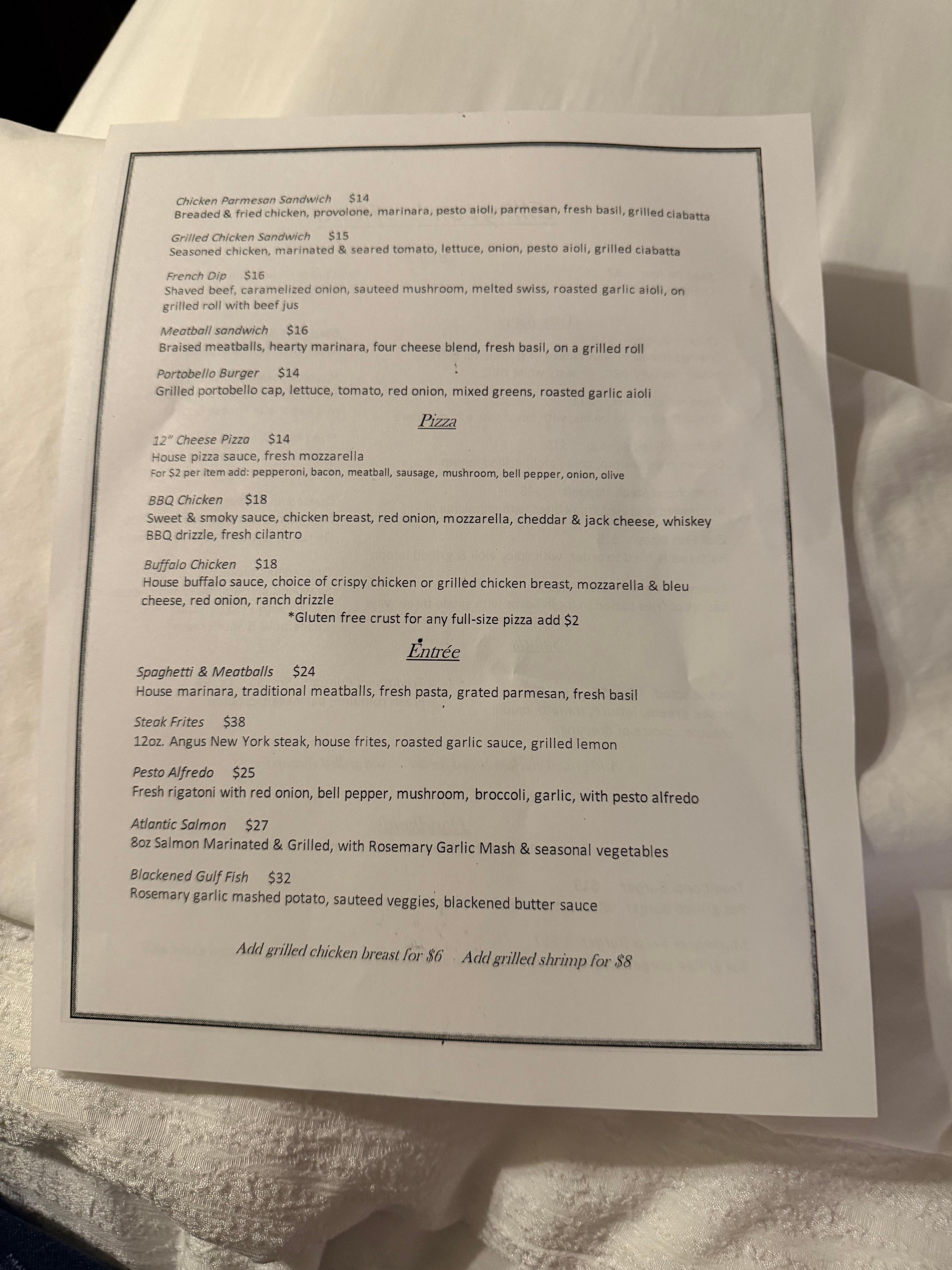 Menu from restaurant on property. 