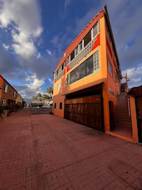 Front of building. Stairs leading to third floor apt.