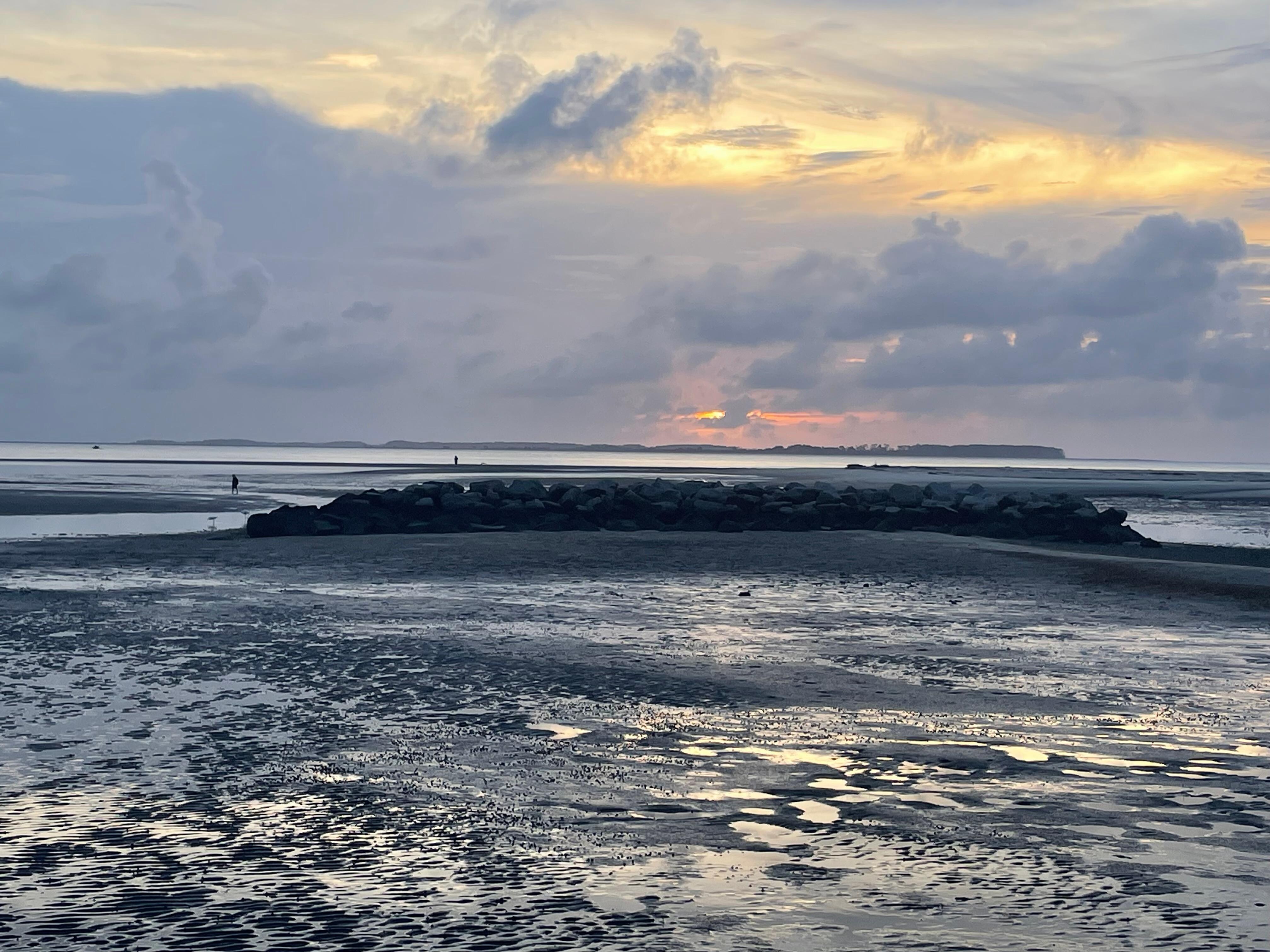 The sunrise was beautiful!  Though it wasn’t a beach conducive to swimming,  it was wonderful for exploring!