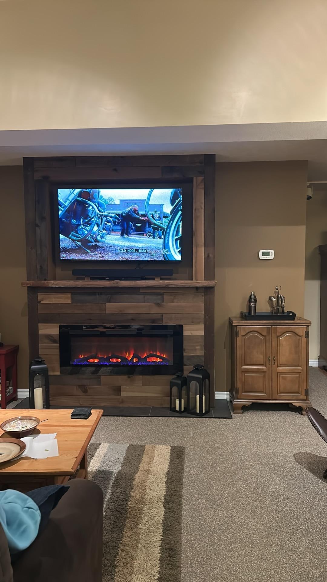 Living room is so cozy with a fireplace! We loved it. 
