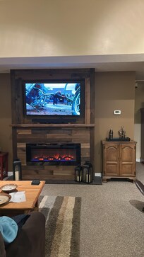 Living room is so cozy with a fireplace! We loved it.