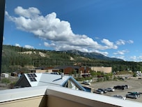 The lovely mountain and river view from our room. Only steps to the Yukon River, Kwanlin Dun Cultural Centre and many shopping options.