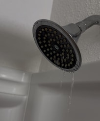 The pressure goes from very low to barely coming out, making it almost impossible to rinse hair.