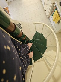 Going down the spiral staircase. Tight squeeze!