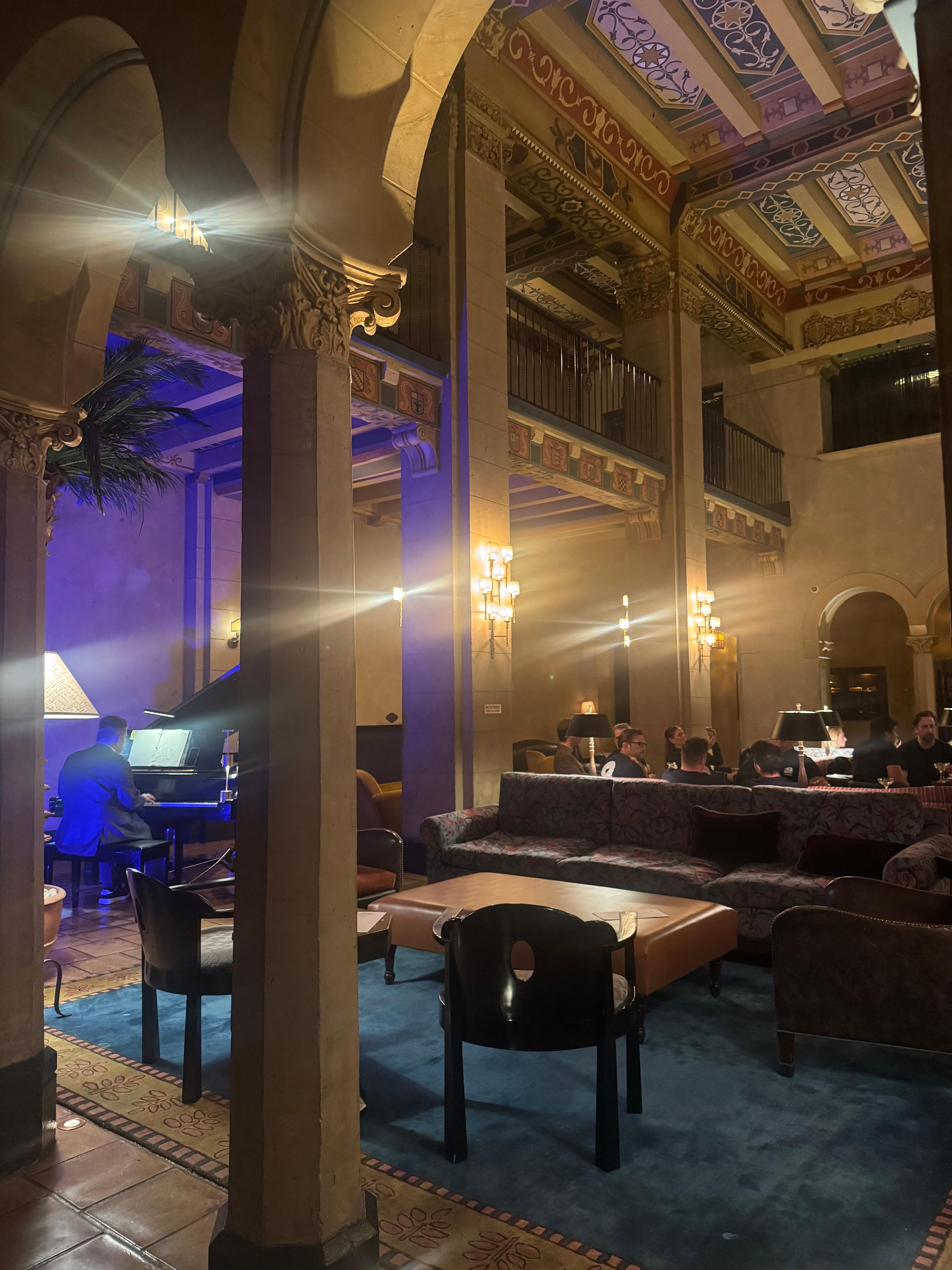 Live piano player in gorgeous bar