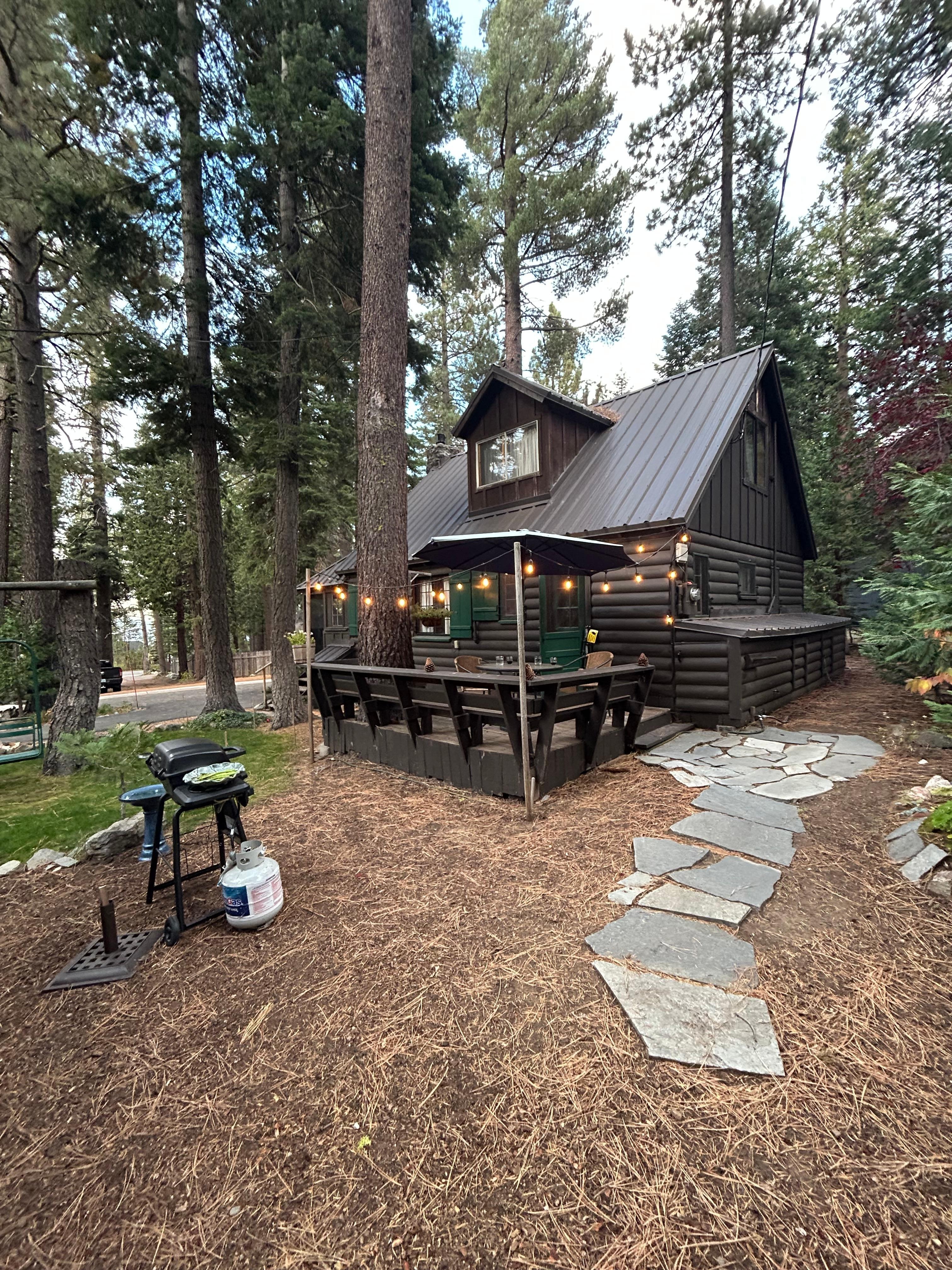 The cabin and the yard next door. 