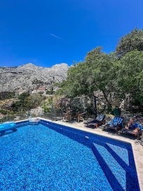 Looking up to the mountains from the pool.