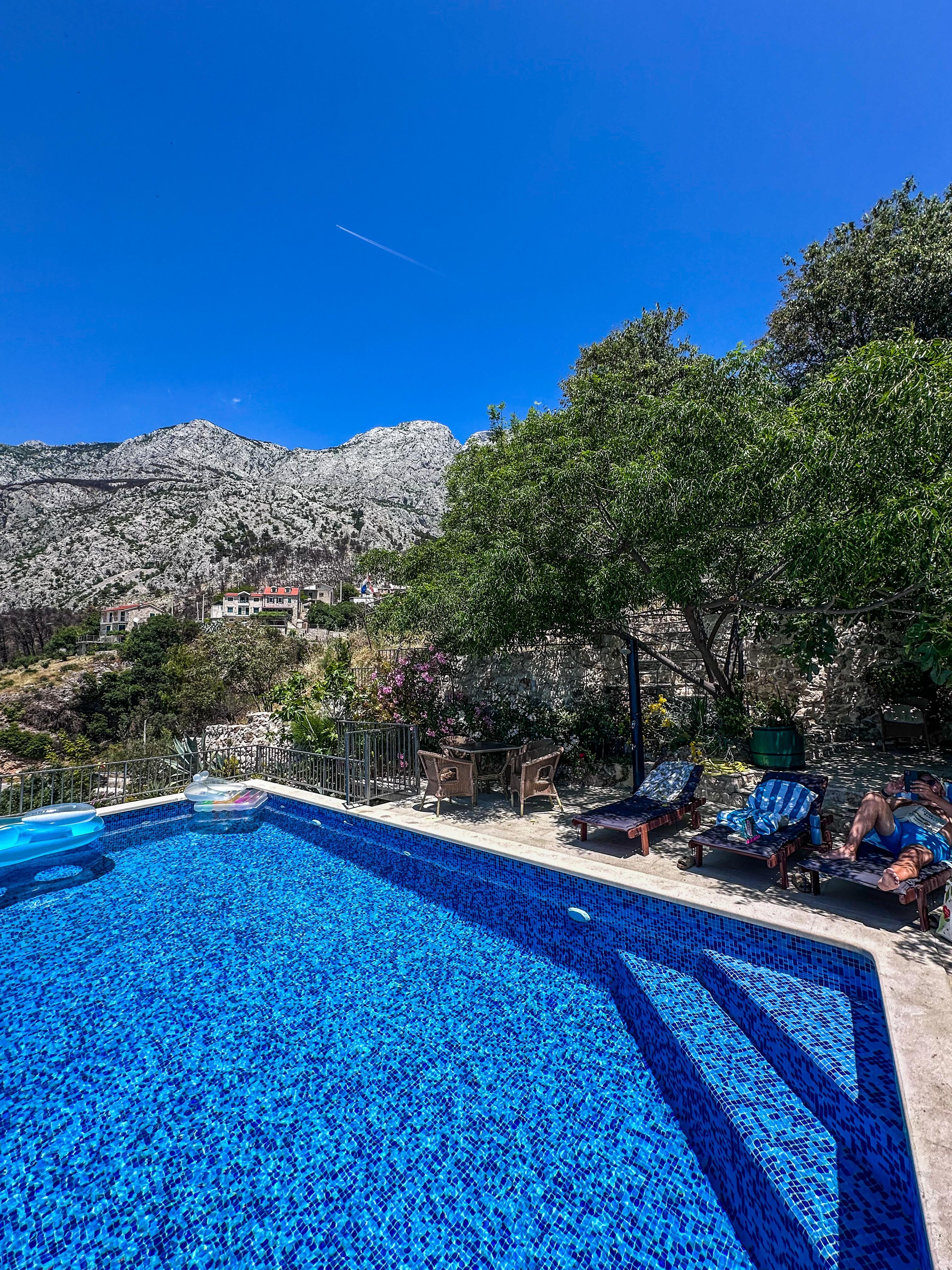 Looking up to the mountains from the pool.