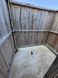 Broken beer bottle in the outside shower. Left behind by previous guest!