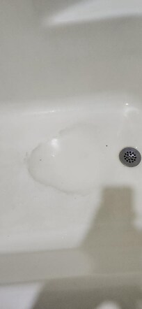 stained (looks brown in picture but really more rust colored)