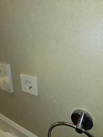 Toothpaste splatter on the walls