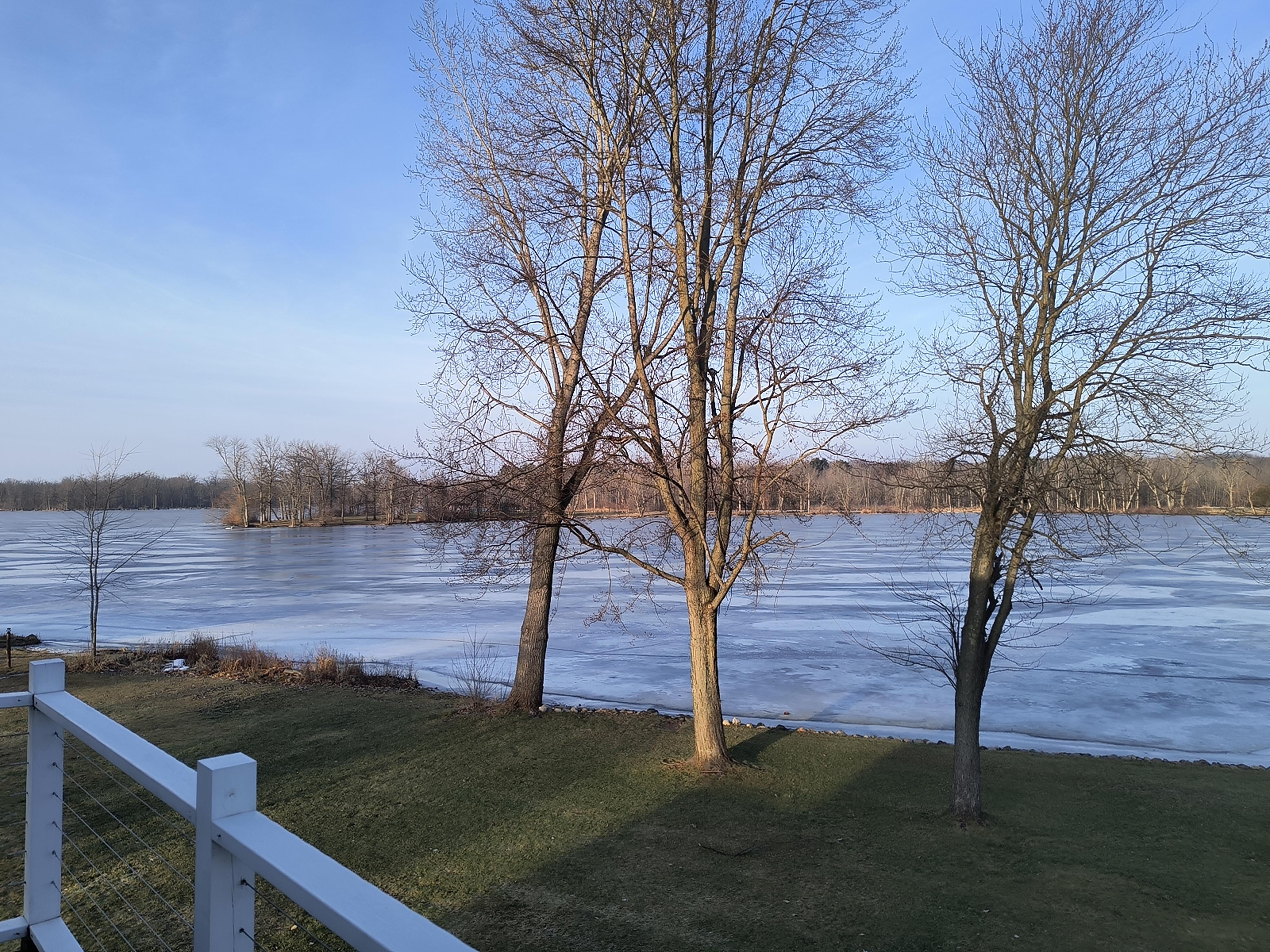 Beautiful view of the frozen lake, tried to get one of the swans- but they flew away.