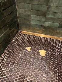 Tiles that lift away stuck to your feet.