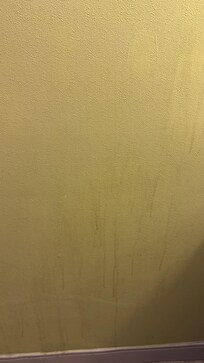 Liquid unknown sticky stains on a different wall - unsanitary conditions