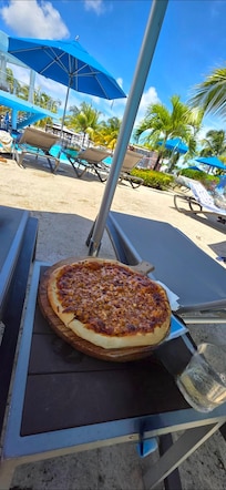 There is also a pizzeria by the pool area, and they can bring your food while you relax by the pool.