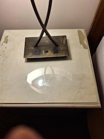 Night stand had splotches, (paint, I assume), that wasn't cleaned.