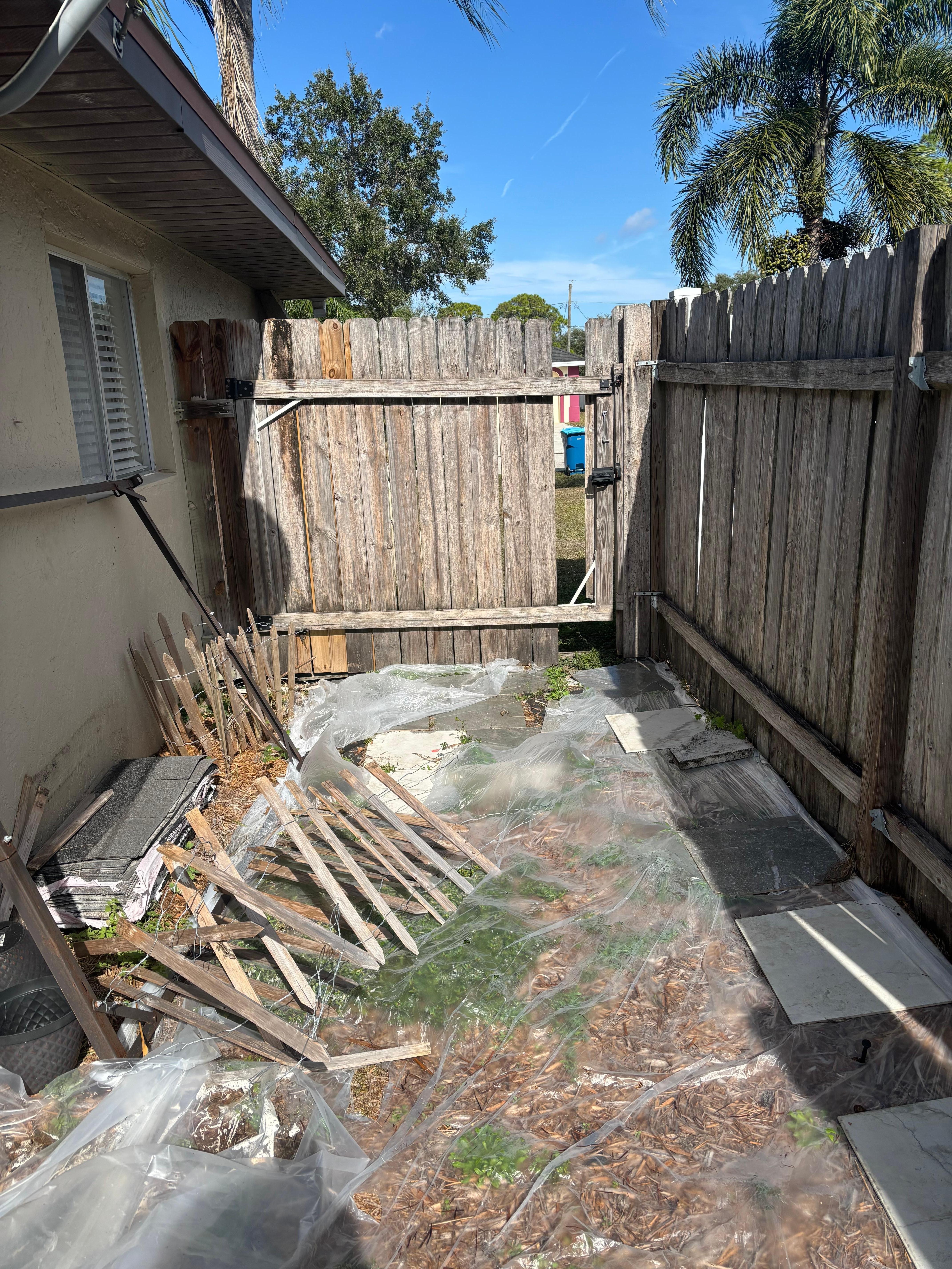 Trash and broken gate 