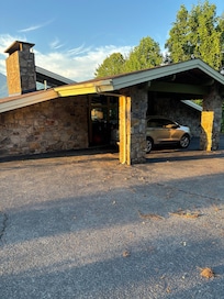 Front view with carport.