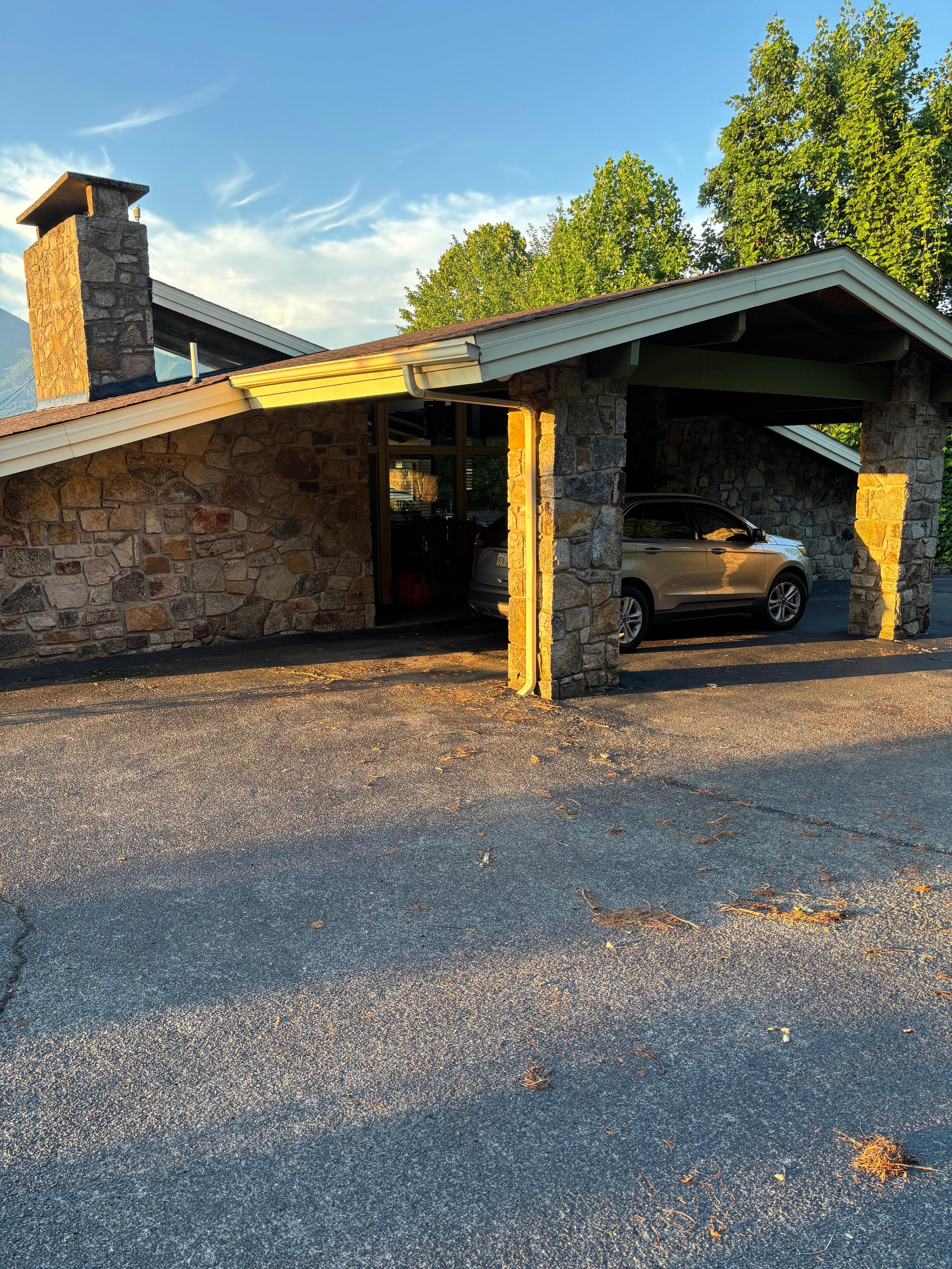 Front view with carport.