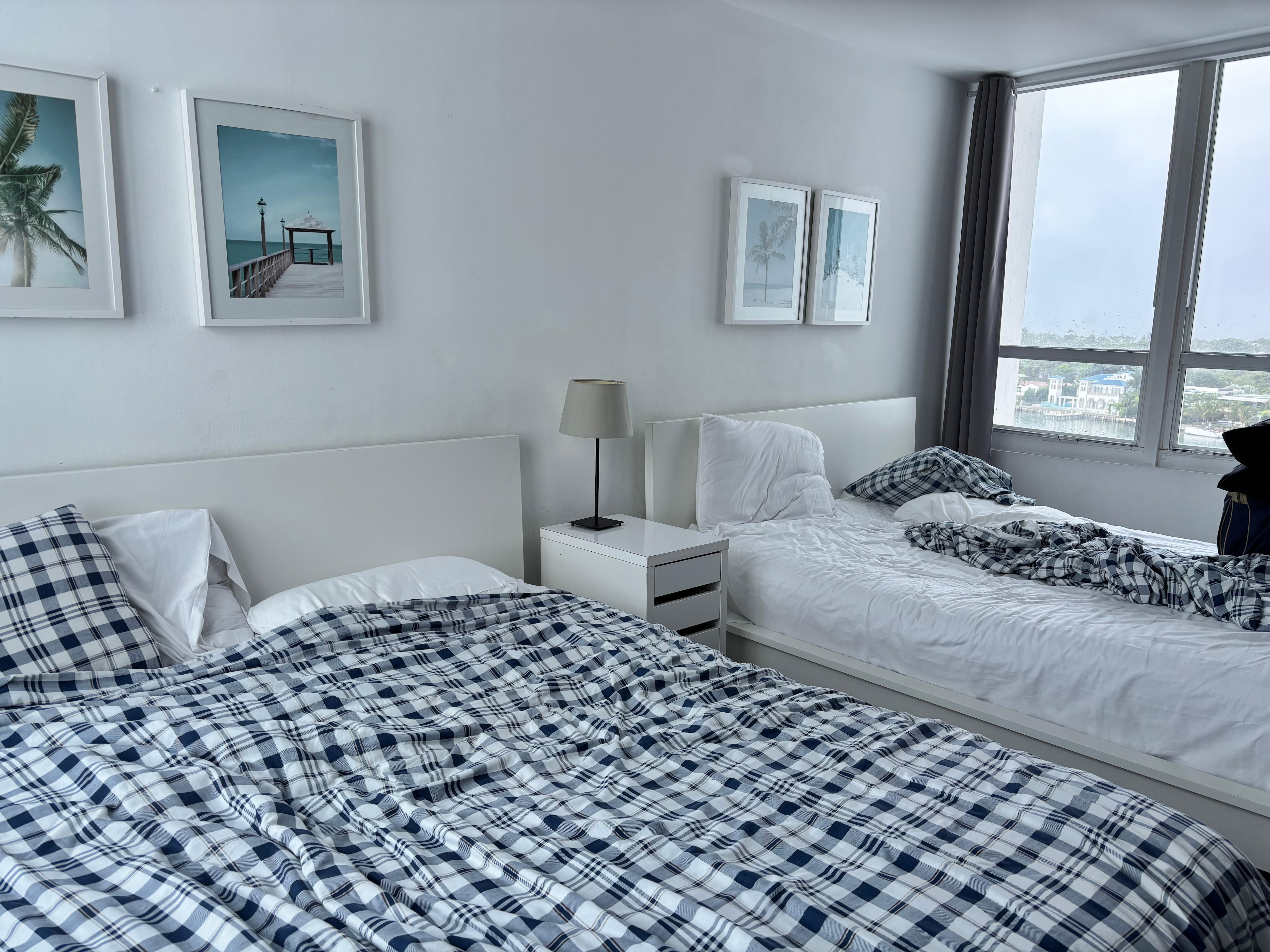 Two queen size bed with a view of the city