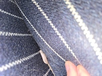 Press on nail from previous tenant left on chair