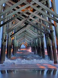 Under the pier around 9pm.