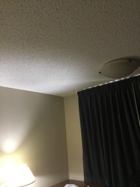 Cottage cheese ceiling and old lamps