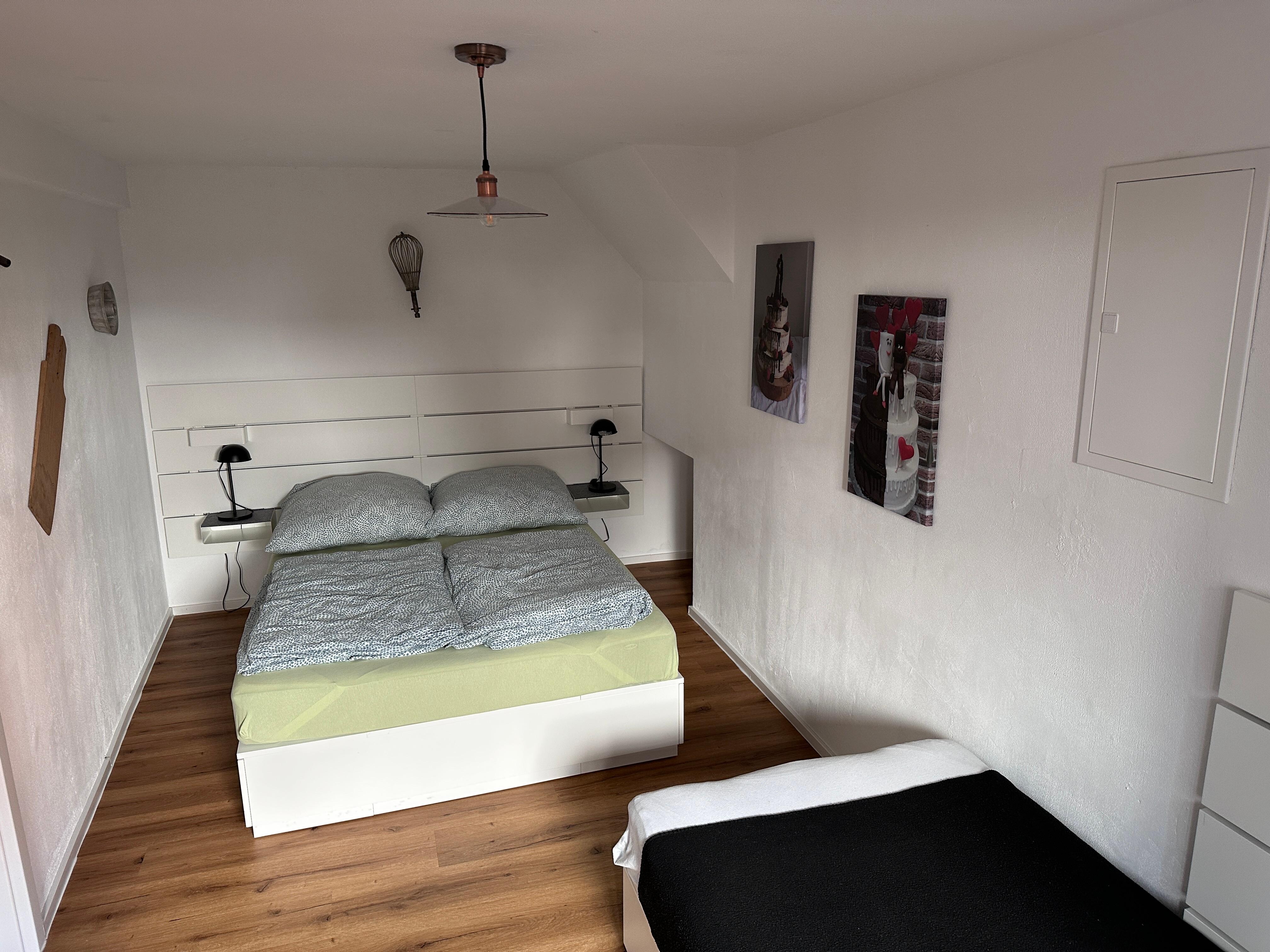 The main bedroom in the business suite