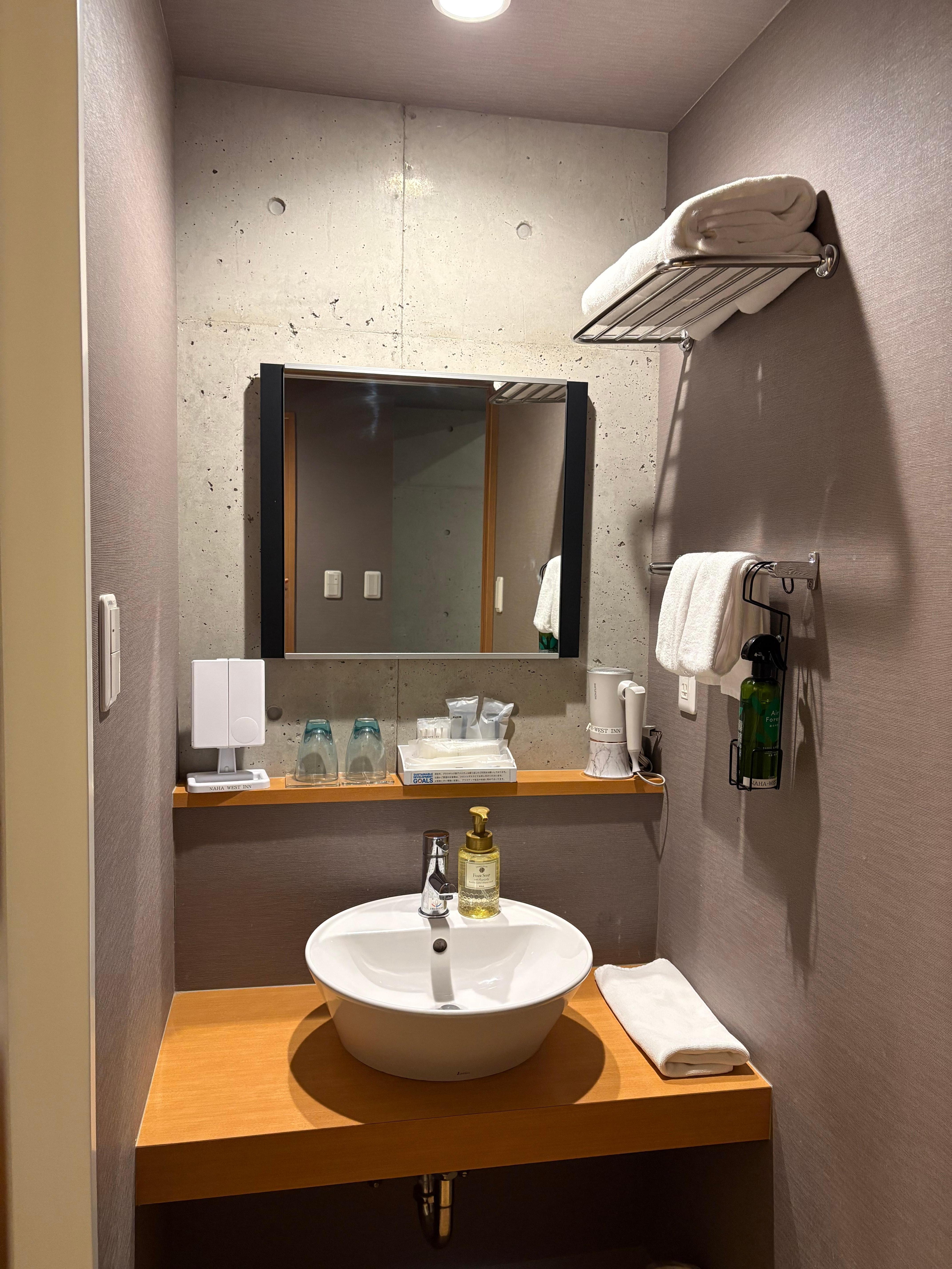 Sink outside of shower room in the bathroom