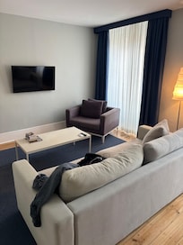 Living room area. Yes, the tv is a little smaller-you didn’t come here to watch tv!