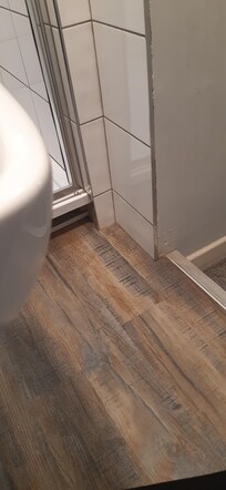 Floor steps to bedroom and corner of sink