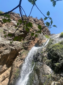 excursion to ourika waterfall, booked by rashid. tour was led by a berber who helped me climb this mountain in flip flops (wear real shoes)