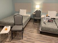 Only place to sit in the room.