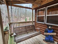 Front porch area with swing!