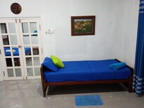 Single bed in larger bedroom suitable for 3 guests