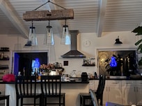 Modern kitchen with extremely cool windows! We brought our own outdoor chandeliers to add to the ambience, and as we packed them to return home, the memories of Mesa Gardens will wink at us from our blue LED chandeliers...