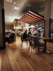 Hotel bar & restaurant. The drinks are stiff and the food is really good. We had a new waiter who made mistakes but he was great about being right quick to fix with a sunny personality. I had a great time workout l without leaving the hotel.